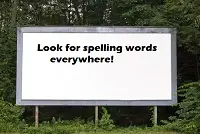 billboard with message, "Look for spelling words everywhere!"