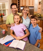 homeschool family with lesson books