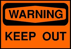 orange KEEP OUT sign