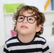 prechool boy wearing big glasses