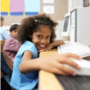 young girl working at computer