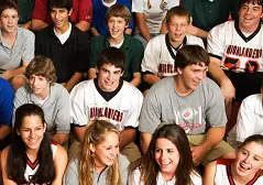 students sitting in bleachers