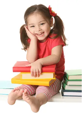 happy young girl with lots of books